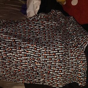 Nike Black and Orange 'Just Do It' Patterned crop top tee